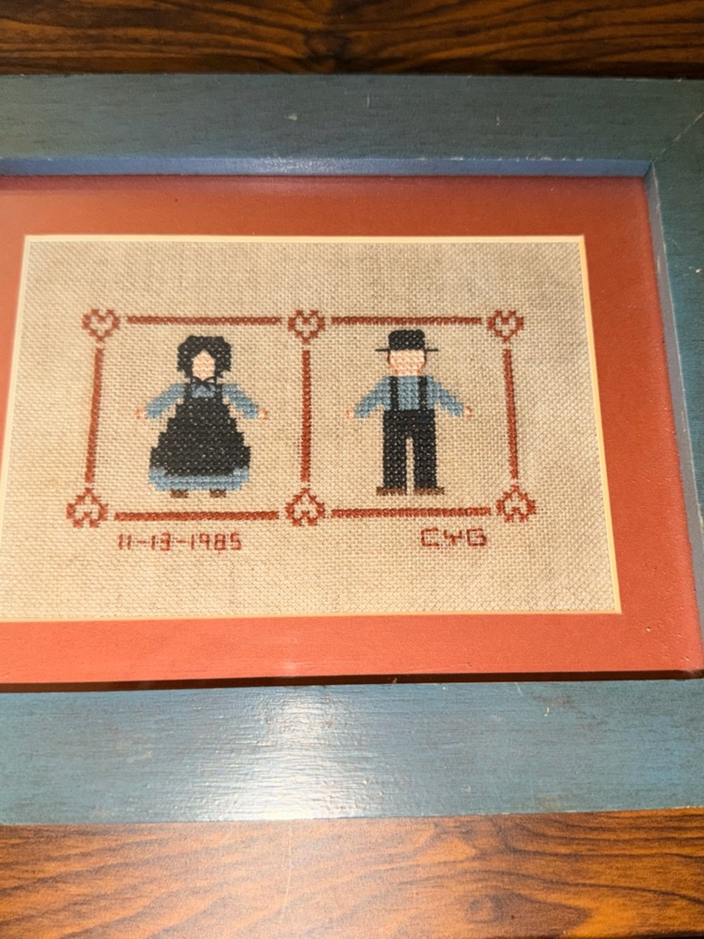 Framed Cross Stitch Folk Couple Art in Blue and Black